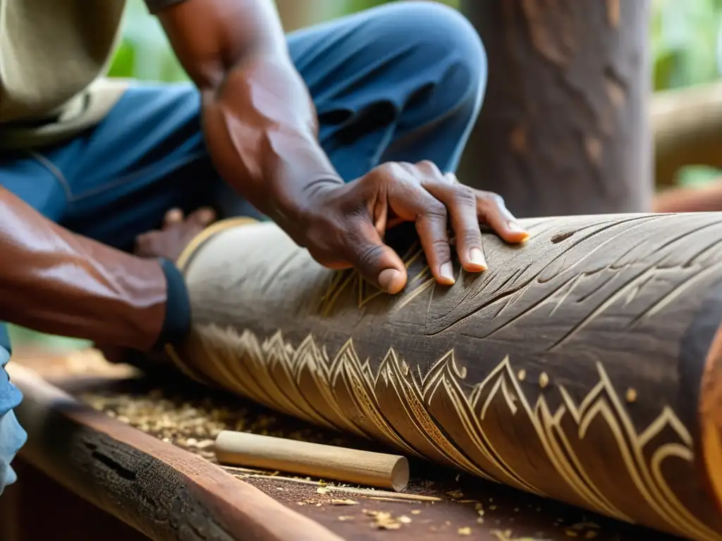 Un artesano indígena esculpe intrincados diseños en un tronco de eucalipto para crear un didgeridoo