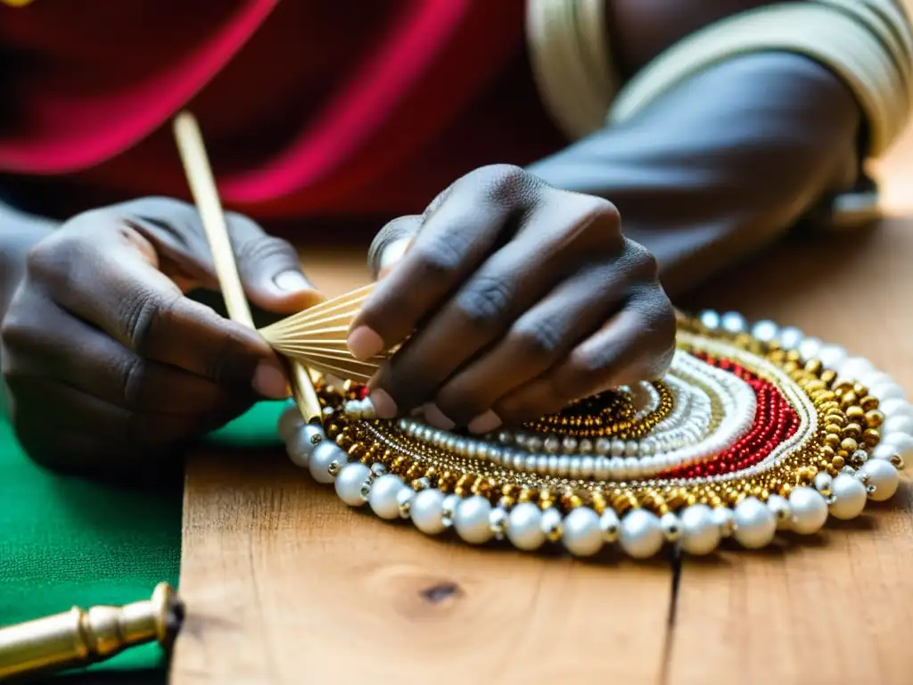 Un hábil artesano africano con joyas tradicionales crea meticulosamente un Asalato