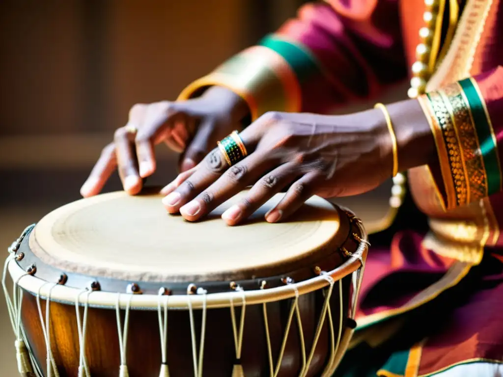 Las hábiles manos del músico de tabla golpean el tambor con movimientos dinámicos, resaltando las técnicas milenarias de percusión tabla india