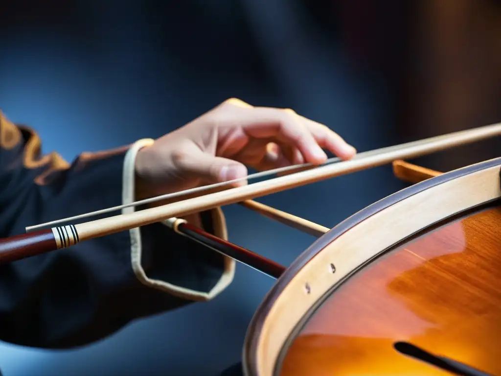 Las manos de un músico experto tocan con gracia el erhu chino, resaltando su historia y sonido