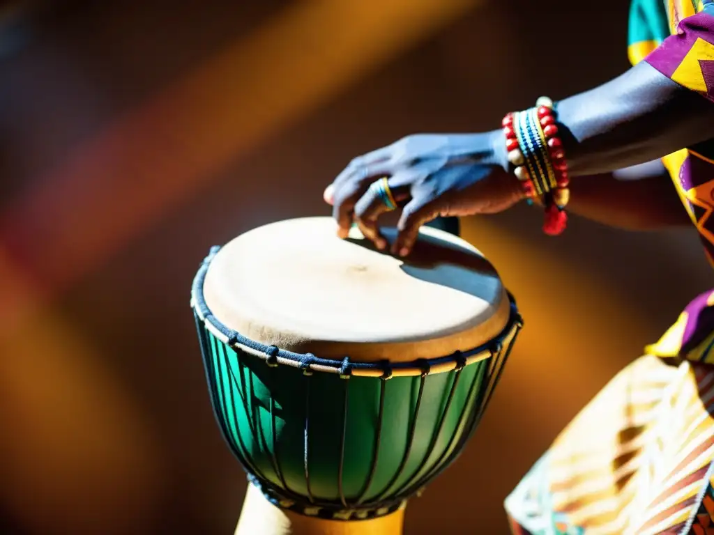 Un músico africano viste trajes tradicionales y toca un djembe, mostrando la relevancia de instrumentos musicales en la educación