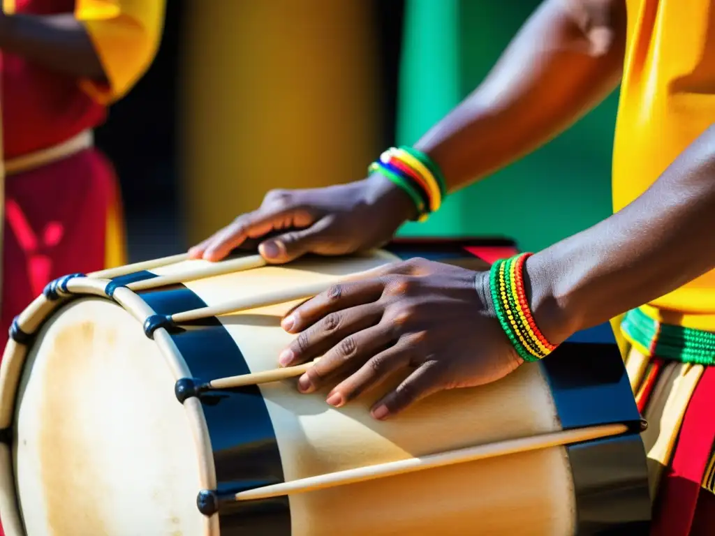 Un músico concentradamente toca un atabaque durante un animado espectáculo de danza afrobrasileña