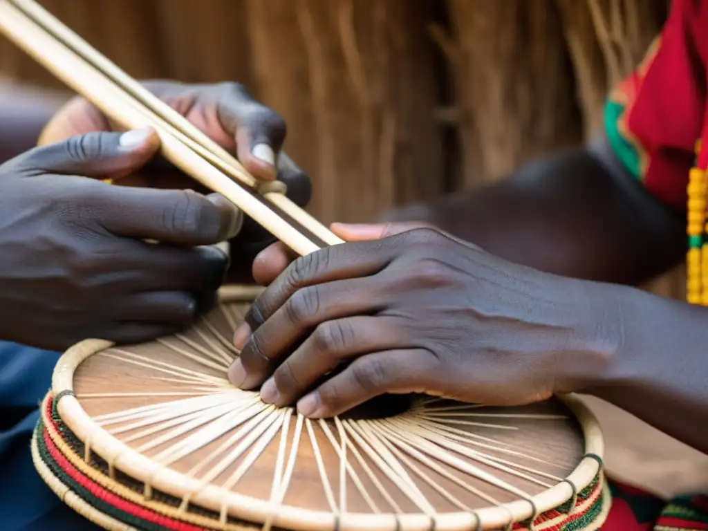 Un músico hábil toca el Endongo, un instrumento tradicional de Uganda, con sus manos curtidas