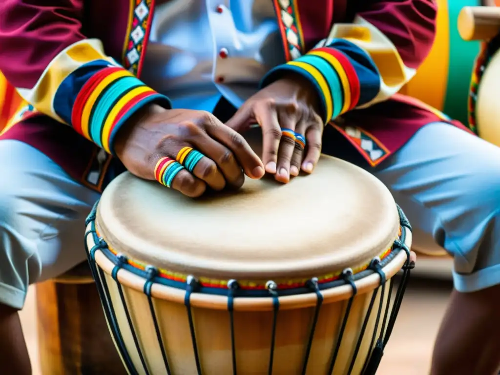 Un músico experto toca el Tambor Alegre colombiano, mostrando su relevancia cultural y artística a través de sus manos adornadas y el tambor decorado