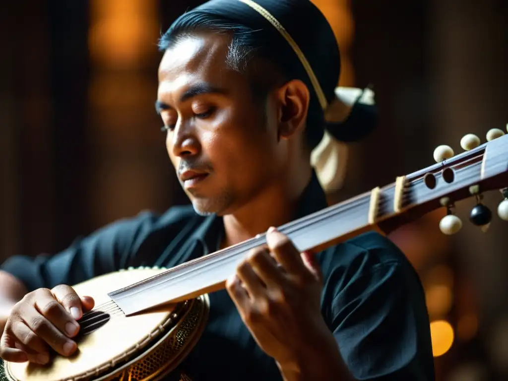 Un músico hábil toca el rebab indonesio en un salón de música javanés